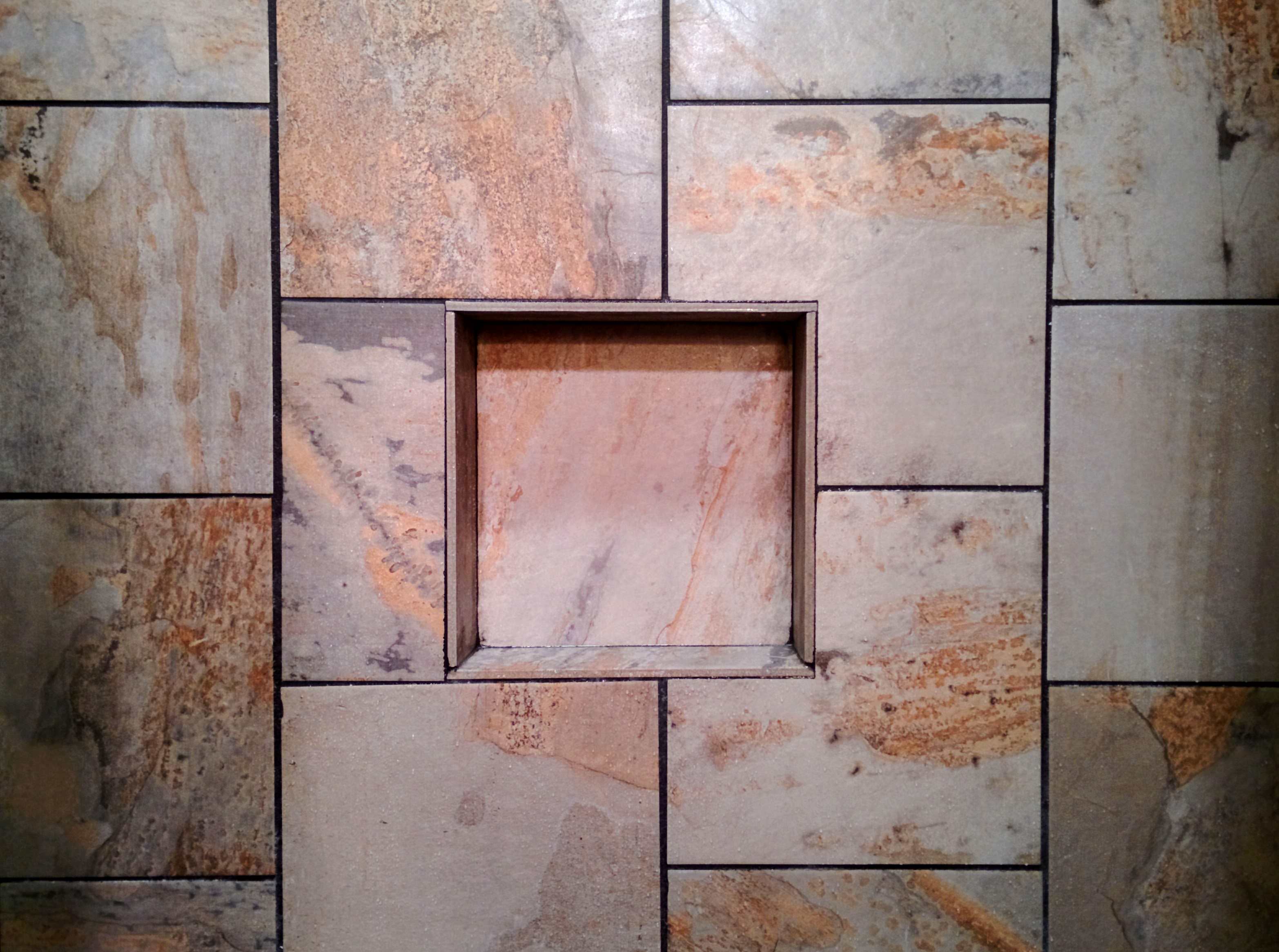 Slate shower wall. | Glamping at the Sky Ridge Yurts.